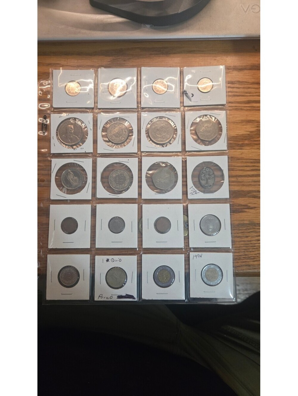 Collection of Vintage and Modern World Coins in Protective Holders